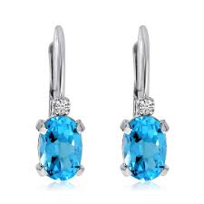 A sprightly and sophisticated pair of ladies halo stud earrings, fashioned from 18ct white gold and each set with a delicious square cut blue topaz, accentuated beautifully by a square halo of glimmering diamonds. 14k White Gold Oval Blue Topaz And Diamond Leverback Earring Karen S Jewelers Oak Ridge Tn