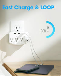 Miniature security camera disguised as a wall outlet