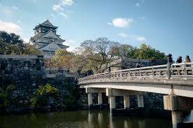 It's only $5 or $6 to go in to see pictures and videos of the old, floor after floor. Osaka Castle Osaka Info