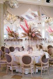 Maybe you would like to learn more about one of these? 25 Irresistible Pampas Grass Wedding Ideas Ruffled Flower Centerpieces Wedding Wedding Floral Centerpieces Wedding Table Centerpieces