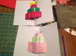 With the detailed trio punch, round the corners from the larger piece (that still has a score line) Present Pop Up Cards 7 Steps Instructables