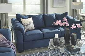 From sweeping pillow arms to flared back cushions, this item's modern beauty is both sleek and chic. Darcy Blue Sofa Loveseat Mathis Brothers Furniture