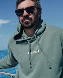 Field-tested, ocean-approved. Rockin' my fave hoodie from @shopfinatics  while chasing fins and filming giants for @sharkweek #SharkWeek 🌊🐋🦈