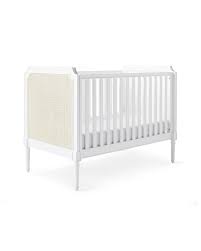 A modern take on an essential piece, this sturdy crib boasts acrylic slats to accent the clean lines. Harbour Cane Convertible Crib Serena And Lily