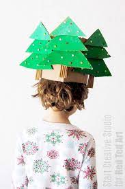 This pattern is perfect for young sewers or adults who need a pattern that works up quickly for gifts or charity. Christmas Tree Hat From Cardboard Red Ted Art Make Crafting With Kids Easy Fun In 2021 Diy Christmas Hats Christmas Tree Hat Cardboard Christmas Tree