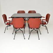 Its wood frame has a teak finish in a brown color and elegant tapered legs. Antiques Atlas 1950s Midcentury Retro And Vintage Dining Suites