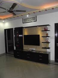 Free download catalogue & magazine online in pdf modern tv units design in living room bulldozerpros unique living with regard to modern design tv cabinets wall showcase designs for hall. Pin By Sriram On Tv Room Decor Popular Interior Design Popular Interiors Showcase Interior Design