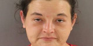 Woman who stole vehicle with child in the back identified