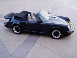 This convertible has great ownership history with books, keys, original msrp and all proper vin tags. 1989 Porsche 911 Carrera Cabriolet Silver Anniversary Edition German Cars For Sale Blog