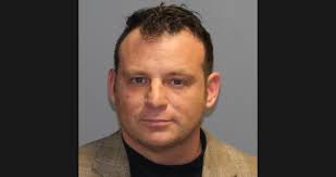 Former professor who faced rape accusation resigns from conservation  commission