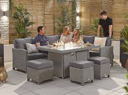 Whether you're after a traditional or casual dining style set, you'll be within our range of garden furniture sets with fire pits there are different seating types including comfy rattan dining chairs with back cushions and corner sofa dining. Casual Fire Pit Rattan Furniture Chimes Home Garden Essex Casual Dining Fire Pit Sets