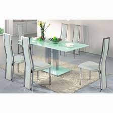 Curved butterfly x shaped sculptural clear lucite base supports a thick bevelled glass. Furnitureinfashion Modern Dining Room Contemporary Glass Dining Room Glass Dining Room Table