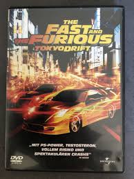 Tokyo drift gets a solid 8 by me it does lacks on the great characters and the cast of the first two movies in the series, but is redeemed by han, awesome car scenes and a pounding score from brian tyler. The Fast And The Furious Tokyo Drift Justin Lin Film Gebraucht Kaufen A02mxkkz11zzi