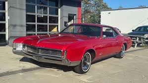 Image result for Riviera Red 1966 GM