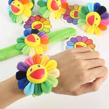 I'm joined here by two of my students to create a sculpture made from recyclables inspired by. Takashi Murakami Colorful Sunflowers Brilliance Eaves Is Flower Plush Fabric Ring Pop Bracelet Bracelets Educational Toy Aliexpress