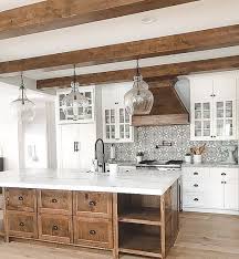 Explore the kitchen cabinets designs from top brands, materials, type, style and choose according to your choices and requirements. White Kitchen With Wood Island