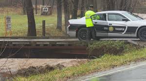 Crash sends vehicle into Sandy Mush Creek