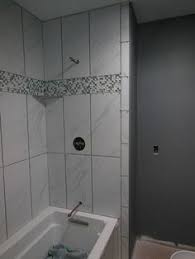 Tiles of the size 12×12 are very comfortable in installation and can be used in creating various patterns. 12 12x24 Shower Tile Designs Ideas Shower Tile Shower Tile Designs Tile Design