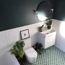 A monochromatic green palette brightens a classic bath. Fresh And Modern Green Bathroom Design Ideas