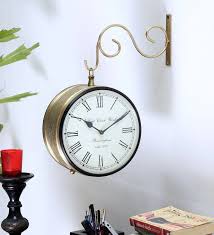 3.9 out of 5 stars. Buy Brass Finish Iron Double Sided Wall Clock Online Kraphy