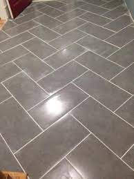 Tile From Lowes Love The Herringbone Pattern Kitchen Floor Tile Patterns Herringbone Tile Floors Patterned Floor Tiles