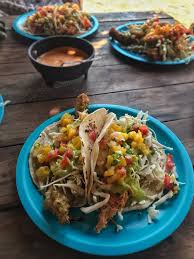 Top with a piece of fried fish, avocado crema, and sliced radish. The Best Fish Tacos In The World Puerto Escondido Mexico The Eating Spree