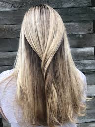 You could also opt for a cool hair color such as ash blonde or platinum to reduce some of the redness that naturally radiates from your warm skin tone. Blonde Highlights With Darker Hair Underneath Blonde Hair Dyed Brown Dark Underneath Hair Brown Hair Underneath