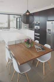 Kitchen counters normally have additional seating space provided with the high chairs or the high stools. 13 Expert Kitchen Extension Table Photos Kitchen Dining Room Combo Kitchen Island Dining Table Modern Kitchen Island