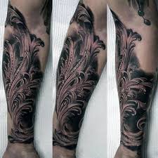 Considered to represent mystery or the impossible a blue rose tattoo marks you as a man or woman of total mystery to wearers. 90 Filigree Tattoos For Men Ornamental Ink Design Ideas