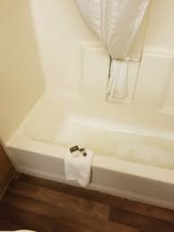 A back up out of a wash tub basin usually means the strainer is clogged and needs to be cleaned. This Was The Shower Water Backing Up In Our Bath Tub From Another Person S Room Picture Of Extended Stay America Philadelphia Airport Tinicum Blvd Tripadvisor