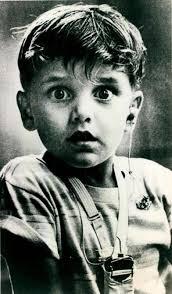 Five-year-old Harold Whittles, deaf from birth, hears for the first time.  Photo taken by Jack Bradley in Peoria, Illinois, circa 1974.