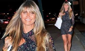 Heidi klum says daughter leni wants to follow in her footsteps but is 'her own little person' for more from heidi klum and tim gunn, pick up the latest issue of people, on newsstands friday. Heidi Klum Saunters Through The Streets Of New York Donning Short Floral Dress Daily Mail Online