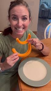 Man Using Spoon Holder to Plate Food