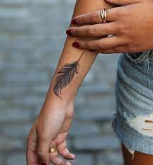 What Tattoo You Should Get Based On Your Sign Tattoos Feather Tattoo Ideas For Women Feather Tattoos