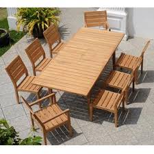 Our teak patio bar and counter dining sets will change your backyard or pool side into a sanctuary. Solid Teakwood 9 Piece Outdoor Dining Set With Extendable Table Cambridge Casual