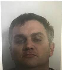 Update: Despite massive manhunt and $5,000 reward, murder suspect remains  at large