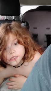 Child with autism overcoming clothing anxiety with robe