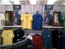 Polo Shirt Display As Part Of The Table Strategy I Moved Core T Shirts Polo S Onto The Back Wal Shirt Display Visual Merchandising Displays Retail Display