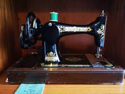 Image result for singer 28k