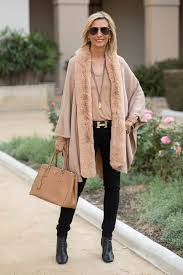 It features wool blended acrylic material to offer your customers a warm and comfy experience. Animal Print And Faux Fur In Black And Camel Jacket Society