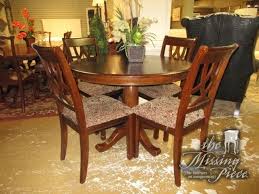 The Leahlyn Pedestal Base Dining Table With Four Chairs From Ashley Furniture This Set Would Be Great In A More Tradit Dining Table Ashley Dining Table Dining
