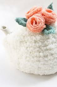Free easy knitting patterns for cozies of all shapes and sizes. Tea Cozy Pattern With Knitted Flowers Handy Little Me