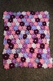 Lilac pink floral pattern blanket. Crochet Flower Baby Blanket Everyone S Loving This Pattern