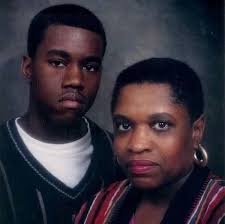 Young Kanye West with his late mother Professor Donda West. Kanye as the  only child was very close to his mother. Rest