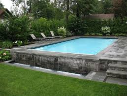 This One Is Completely Elegant And Unique By Creating Some Fun Special Effects The Waterfall Feel Sur Pool Patio Swimming Pools Backyard Swimming Pool Designs