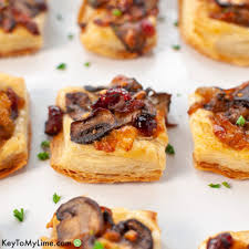 Mushroom Puff Pastry Bites Easy Holiday Appetizer Key To My Lime Recipe Puff Pastry Recipes Appetizers Holiday Appetizers Easy Christmas Recipes Appetizers
