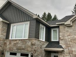 Trucedar® carbon steel siding accurately replicates the popular vertical craftsman style of board and batten available in wide (10) and narrow (6) profiles. Trucedar Steel Siding Statuary Bronze Solid Transitional Exterior Grand Rapids By Quality Edge Houzz