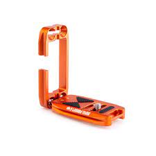 A strap loop located on the side allows for a hand or shoulder strap to be attached. Midwest Photo 3 Legged Thing Ellie Short Universal L Bracket With Shorter Base Copper Orange