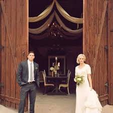 Breathtaking Barn Entry Doors At The Elegant Barn A Wedding And Event Venue In Gilbert Az Bride Hair Down Brides Maid Hair Farm Wedding