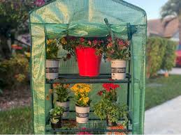 Outdoor portable greenhouse mini walk in 3 tiers 12 shelves stands small shelving green house for herb and flower. 3 Tier Portable Greenhouse Whisper Peak The Grommet